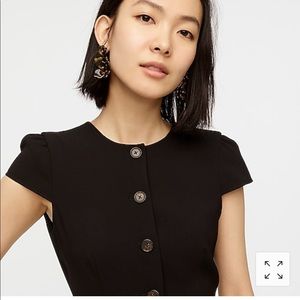 Button-front cap-sleeve dress.